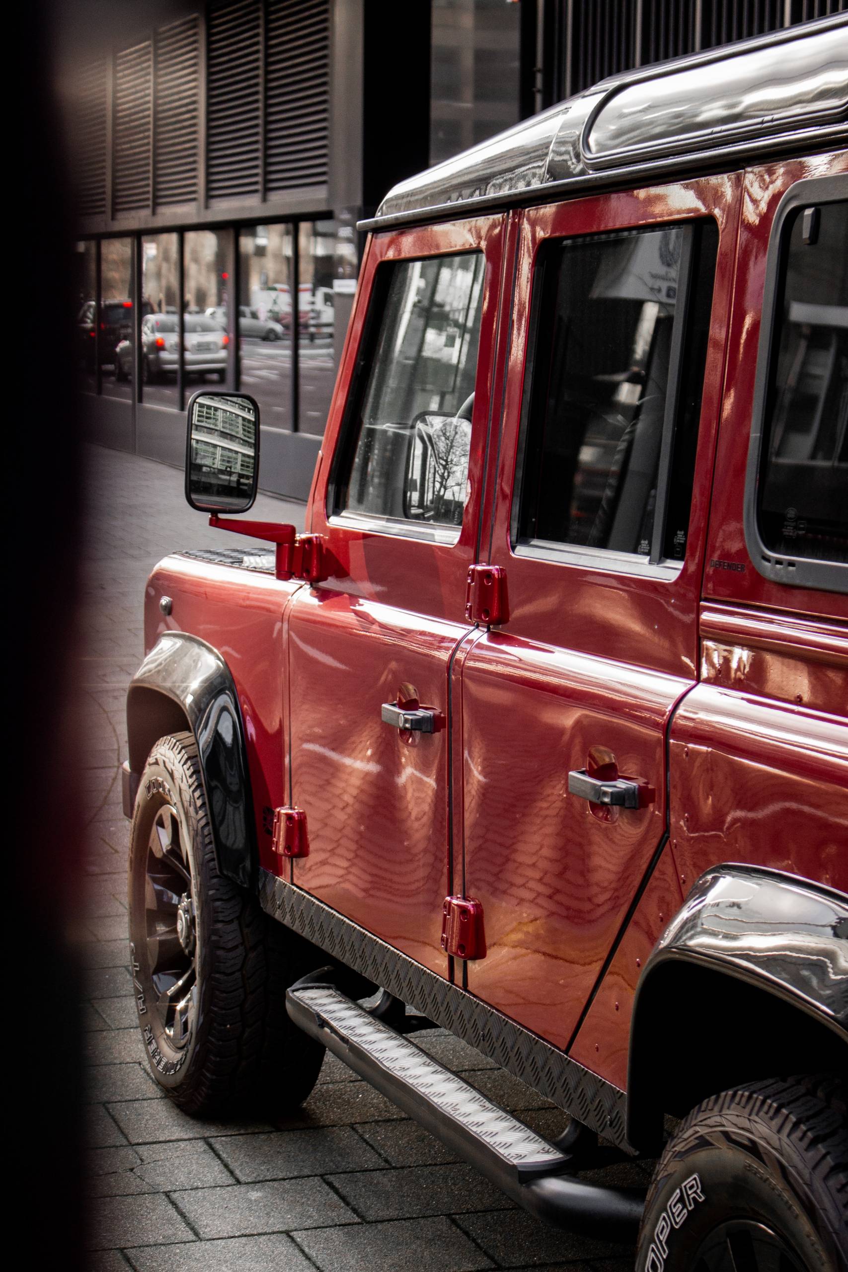 red land rover defender available for finance
