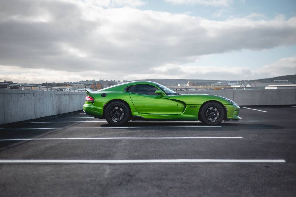 Lime green dodge viper in parking structure