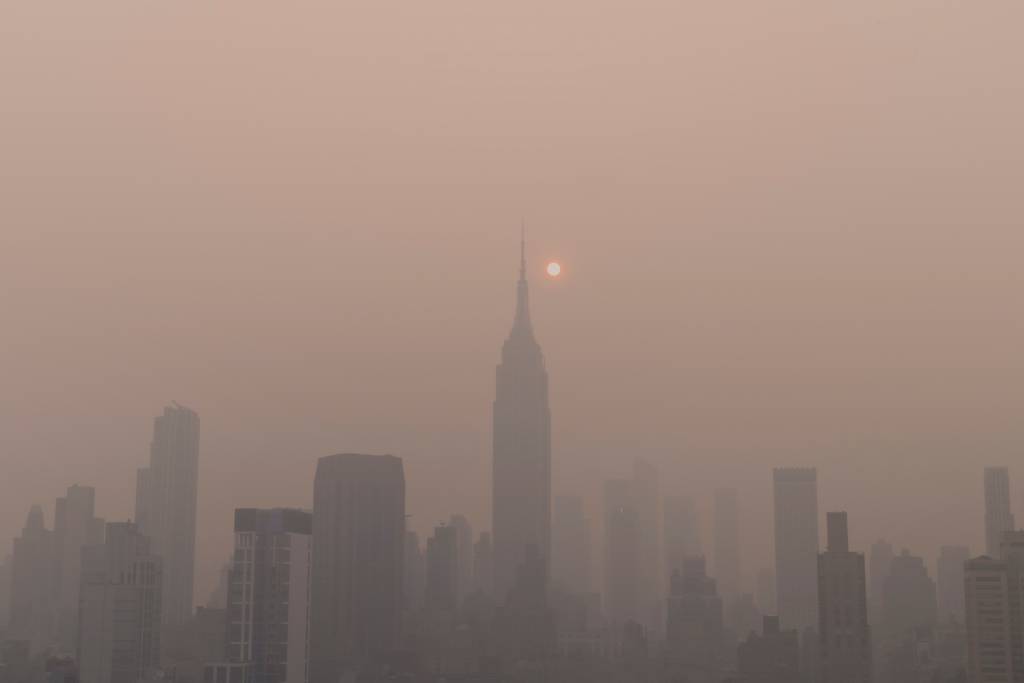New york city skyline with air pollution due to fires